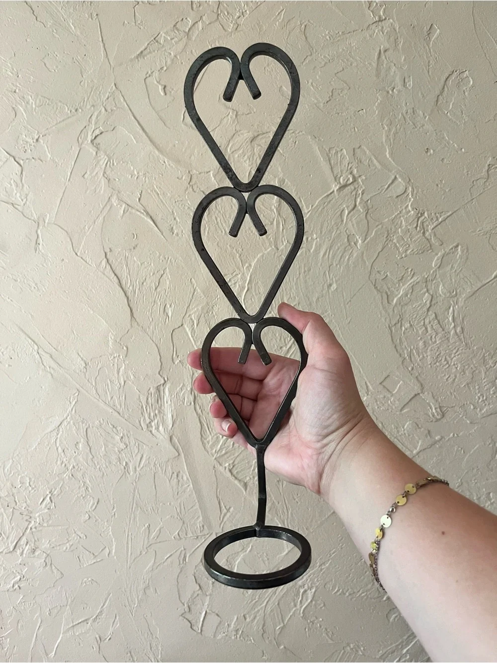 Vintage heavy duty metal sconce with hearts